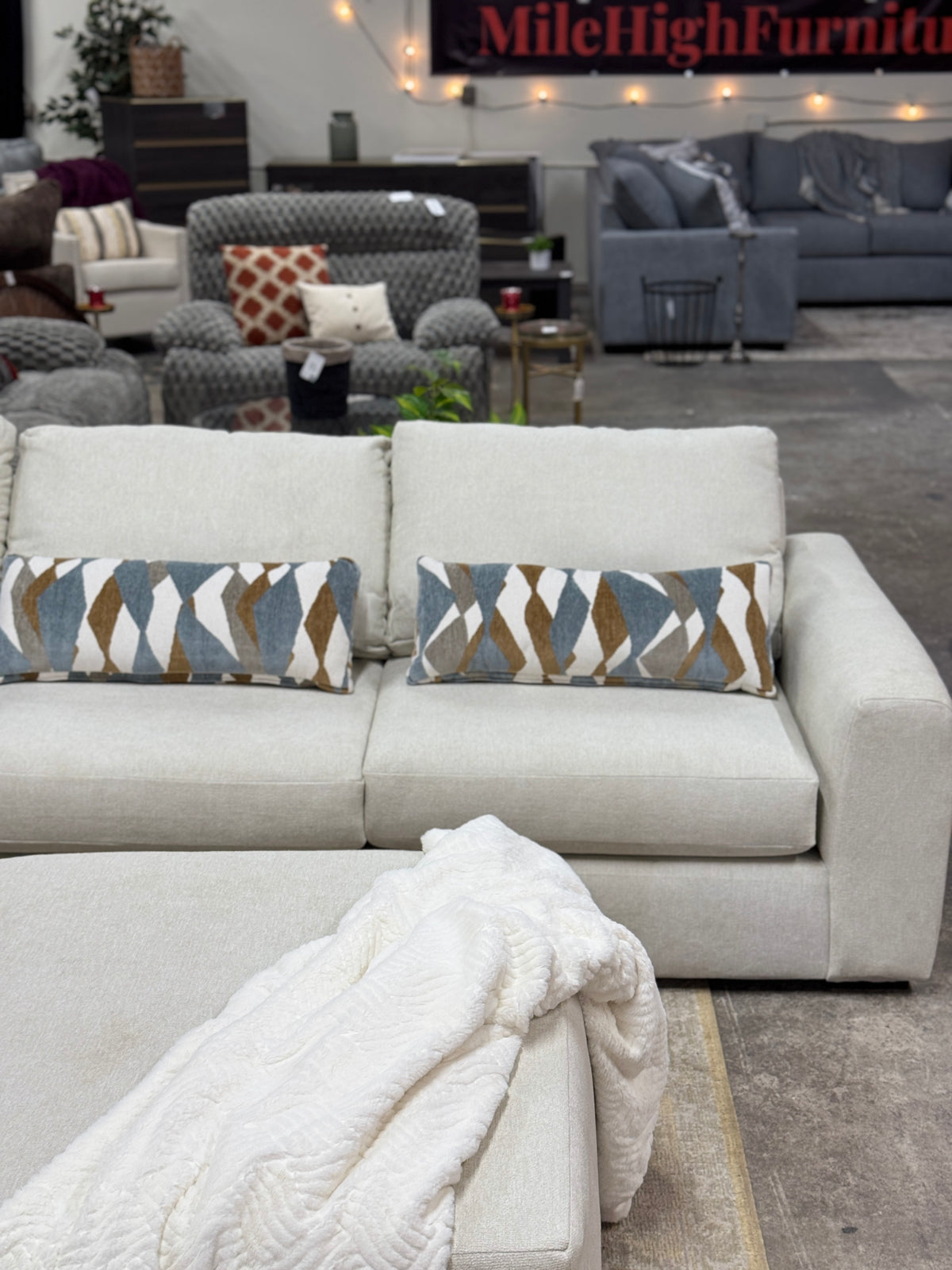 Cascade L-Shape Sectional in Cream with Rolling Ottoman